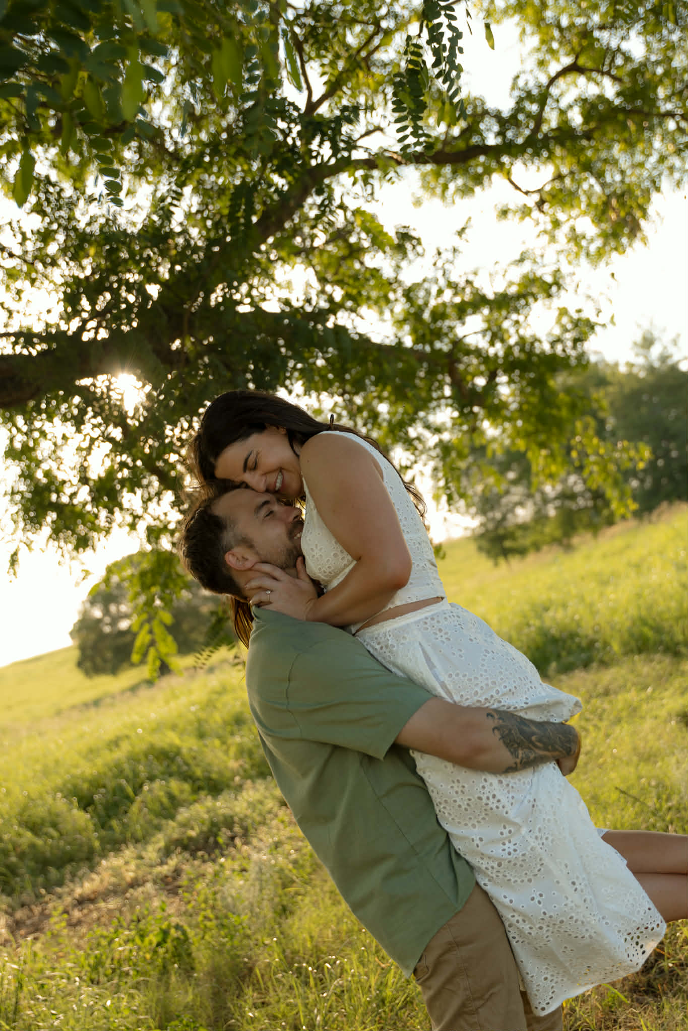 Courtney and Oliver under a tree